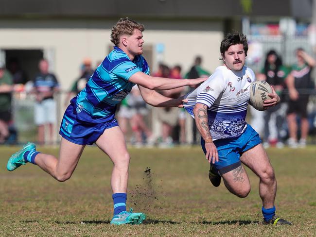 Drew Williams grabs hold of Michael Kanis-Parker. Picture: Adam Wrightson Photography