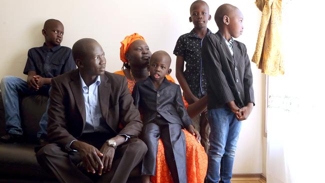 Majok Tulba with his wife Mary and their four children. Picture: James Croucher.