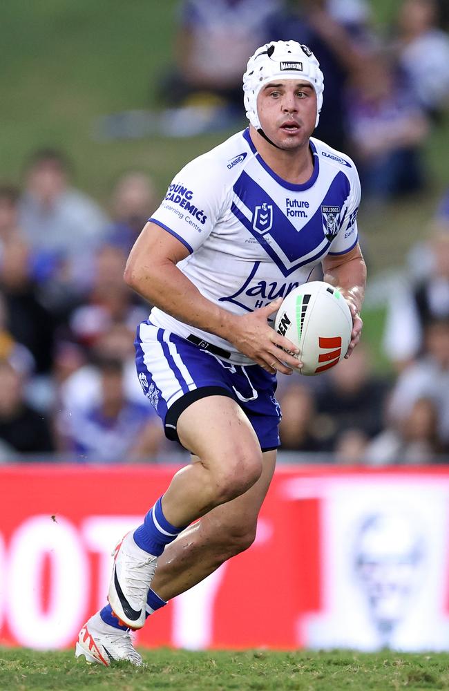 Reed Mahoney of the Bulldogs runs the ball during the NRL Pre-season challenge match between Canterbury Bulldogs and Melbourne Storm at Belmore Sports Ground on February 15, 2024 in Sydney, Australia. (Photo by Brendon Thorne/Getty Images)