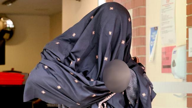 ADELAIDE, AUSTRALIA - NewsWire Photos 12,April, 2024: A 14-year-old girl leaves the Adelaide youth court after facing court on charges of possessing explosive instructions and extremist material Picture: NCA NewsWire / Kelly Barnes