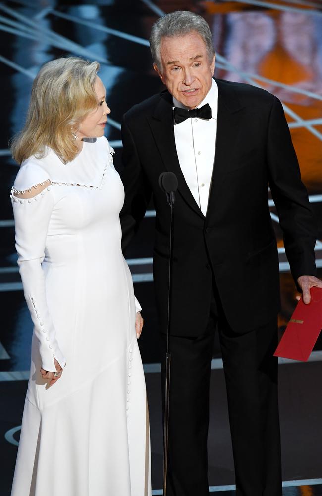 Faye Dunaway looks on as Warren Beatty speaks onstage during the 89th Annual Academy Awards on February 26, 2017 in Hollywood. Picture: Getty