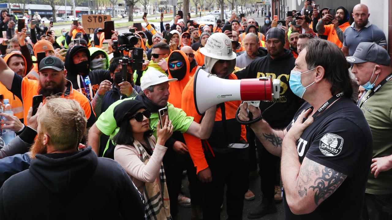 Victorian State Secretary John Setka attempts to talk to the angry crowd outside the CFMEU office. Picture: David Crosling