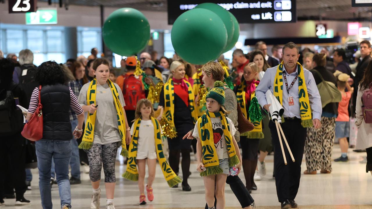 Fans at Brisbane Airport to greet the Matildas’ return on Tuesday. Picture: Nigel Hallett