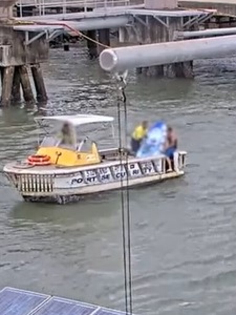 Man and boat were hauled back to shore by a kind port crew. Picture: 7 News