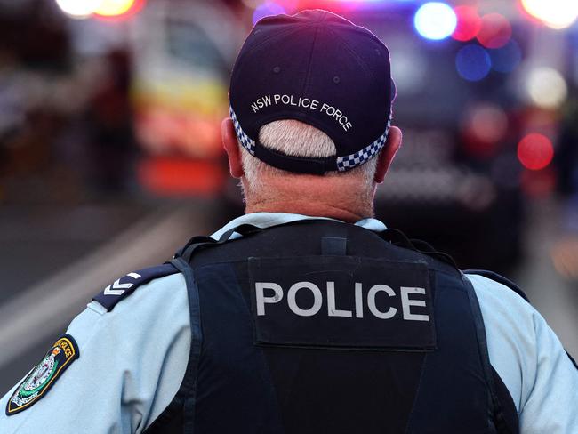 Police cordon off the Westfield Bondi Junction shopping mall after a stabbing incident in Sydney on April 13, 2024. Australian police on April 13 said they had received reports that "multiple people" were stabbed at a busy shopping centre in Sydney. (Photo by David GRAY / AFP)