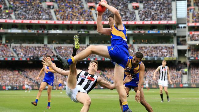 West Coast's Jeremy McGovern takes a big mark in the final quarter. Picture: Mark Stewart