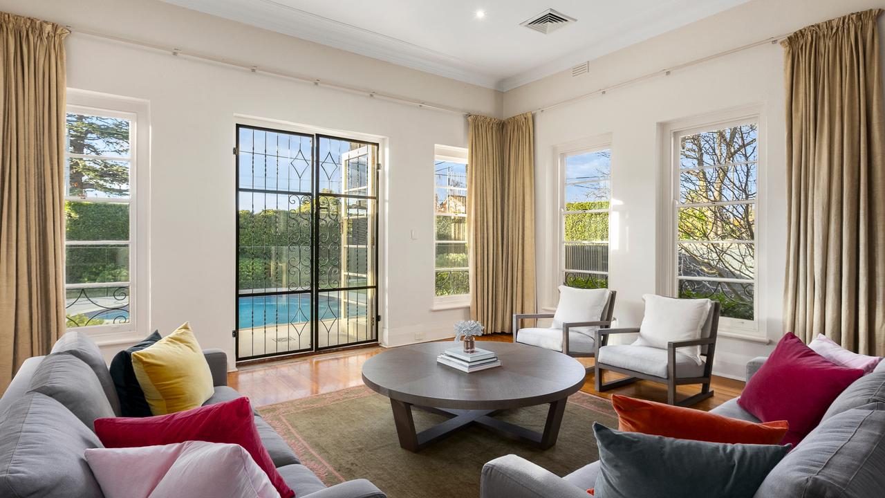 The sun room has pool and garden views.