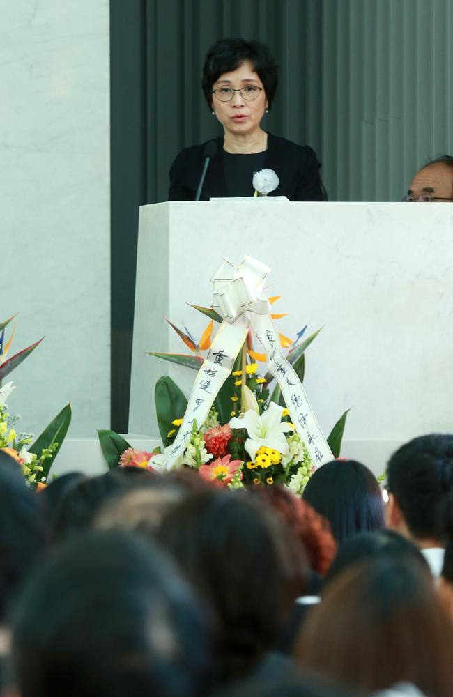 Dr Hong Shi delivers a speech at the funeral of Dr Luping Zeng at the Holland Park Mount Thompson Memorial Gardens on Saturday April 27, 2019. AAP/Image Sarah Marshall