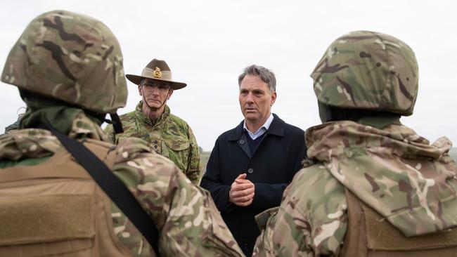 Defence Force chief General Angus Campbell, left, and Defence Minister Richard Marles in Britain this week. Picture: Kym Smith