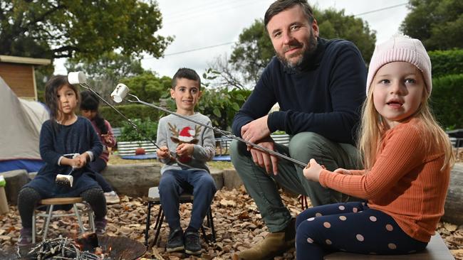 28/5/21. The story is about Celebrating Early childhood education in SA: The  Lady George Kindergarten encompasses education and fun in it's daily activities - Mia, Noah, Director Brett Gent and Kate learning about camping fires..Picture: Keryn Stevens