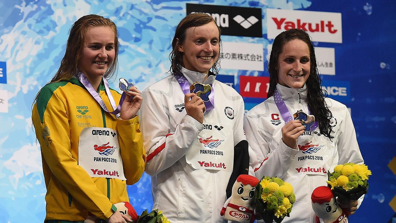 Titmus was most proud of her silver medal in the 800m behind Katie Ledecky (centre). (AAP Image/Matt Roberts)
