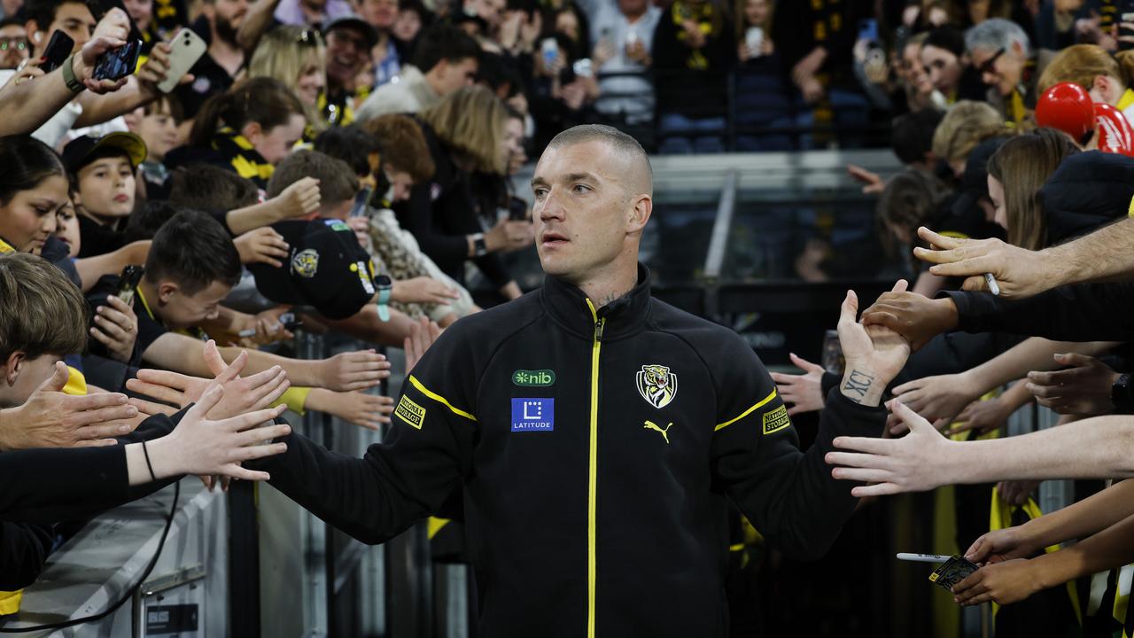 NCA. MELBOURNE, AUSTRALIA. August 24, 2024. AFL Round 24. Richmond vs Gold Coast Suns at the MCG. Richmonds Dustin Martin comes out onto the MCG for his lap of honour . Pic: Michael Klein