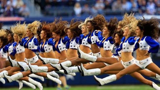 The Dallas Cowboys cheerleaders perform at Cowboys Stadium in Arlington, Texas. Picture: Getty Images