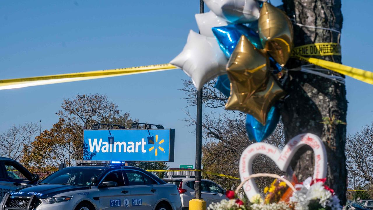 A memorial is seen at the site of a fatal shooting in a Walmart on November 23, 2022 in Chesapeake, Virginia. (Photo by Nathan Howard / GETTY IMAGES NORTH AMERICA / Getty Images via AFP)