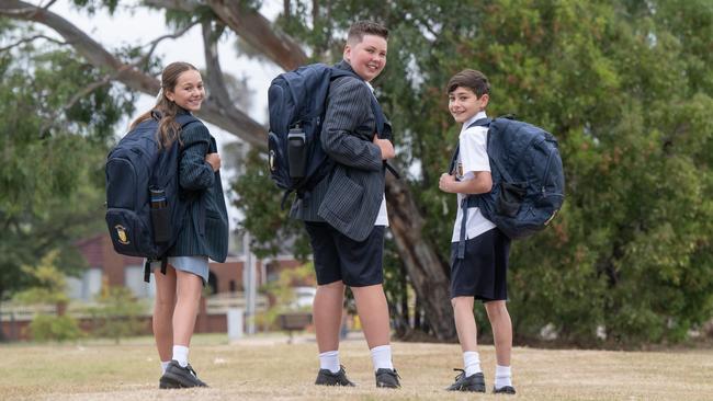 Year 7 students Holly Egan, Flynn Hyland and Daniel Hainagiu’s parents picked St John's Regional College after going on a school tour. Picture: Tony Gough