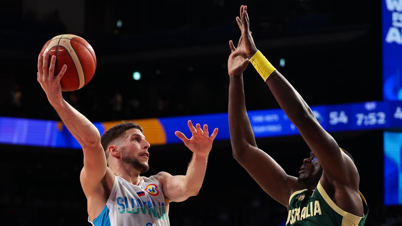 Sloevnia’s Aleksej Nikolic drives to the basket against Duop Reath. Picture: Getty Images