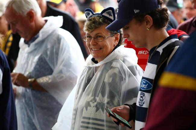 BRISBANE, AUSTRALIA - OCTOBER 24: Cats fans arrive to the gate before the 2020 AFL Grand Final match between the Richmond Tigers and the Geelong Cats at The Gabba on October 24, 2020 in Brisbane, Australia. (Photo by Jono Searle/AFL Photos/via Getty Images)