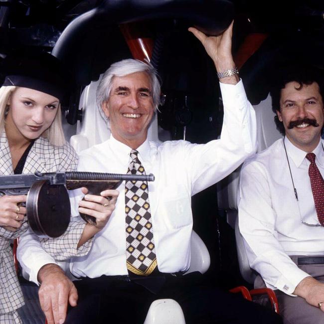 Bonnie and Clyde lookalikes from Movie World on the Gold Coast, with CEO of Warner Bros theme parks, Mr John Menzies