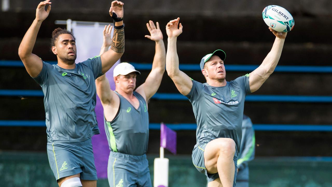 Lukhan Salakaia-Loto, Michael Hooper and David Pocock take part in a training session.