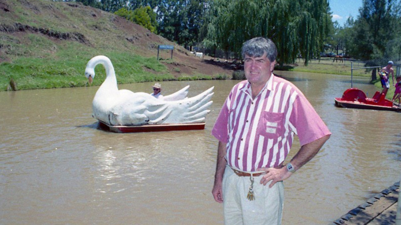 Willow Springs Adventure Park owner Jim McEwan in front of the swans in December 1994. Photo: Errol Anderson