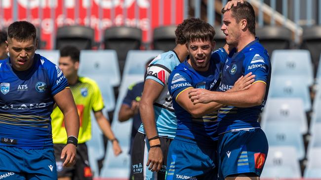 Jai Camilleri and Beau Lucien after the fulltime siren.Picture: Adam Wrightson Photography. SG Ball Cup Round 2.Cronulla Sutherland Sharks vs Parramatta Eels.Pointsbet Stadium.10 February 2024.