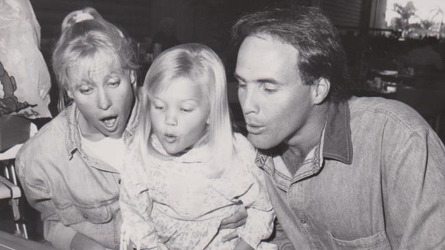 A young Jaimi with her mum and dad. Picture: Regina King