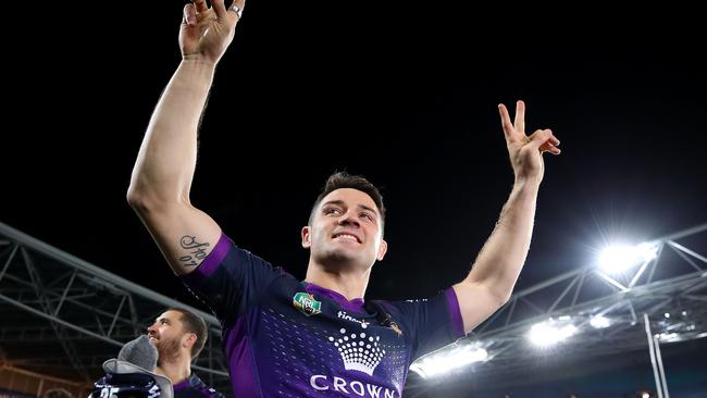 Cooper Cronk of the Storm celebrates after winning the 2017 NRL Grand Final.
