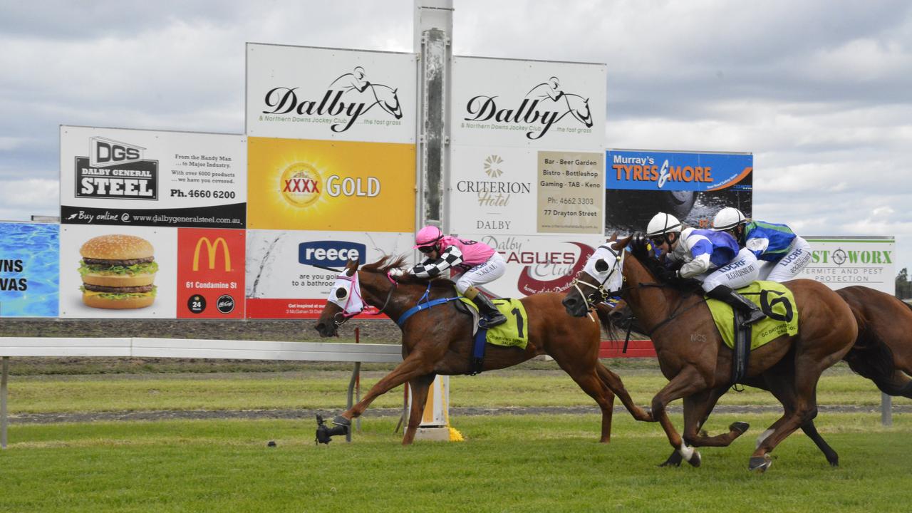 Tisani Tomso holds on for a narrow win over Marksfield (outside) and Reward For Fashion in last year's Dalby Newmarket Handicap at Bunya Park.