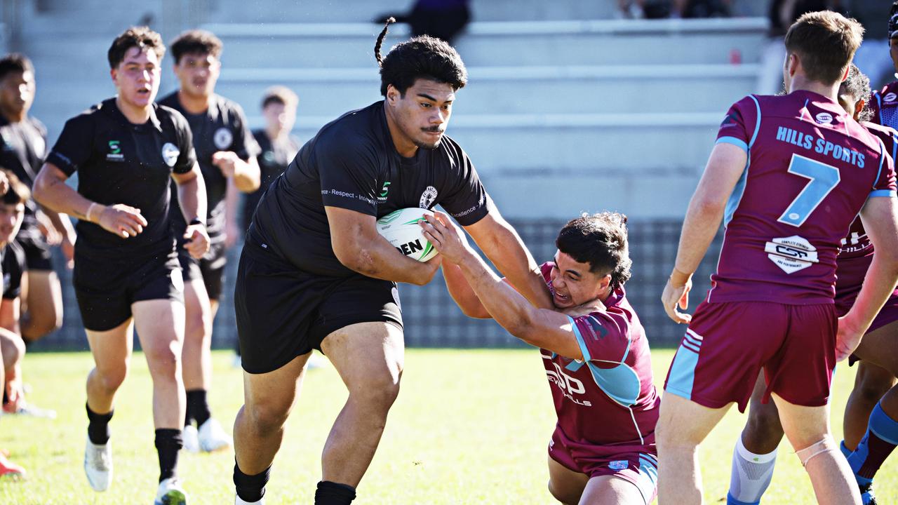 Action from the Round 1 Peter Mulholland Cup clash between Hills SHS and Central Coast SC at Woy Woy Oval. Picture: Adam Yip