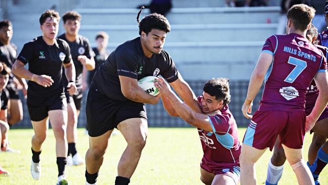 Action from the Round 1 Peter Mulholland Cup clash between Hills SHS and Central Coast SC at Woy Woy Oval. Picture: Adam Yip