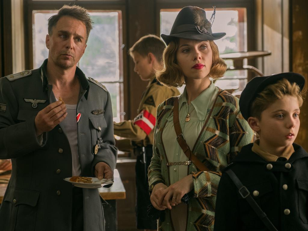 From left, Sam Rockwell, Scarlett Johansson and Roman Griffin Davis in a scene from the movie Jojo Rabbit. Picture: Supplied