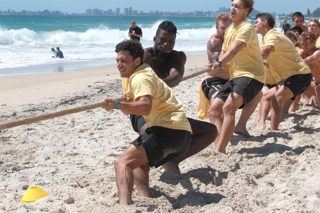 The Southport Sharks VFL team during a preseason training camp at Tallebudgera Beach. Picture: Mike Batterham. Michael Selsby pictured at the front of the tug-of-war battle. Picture: Mike Batterham.