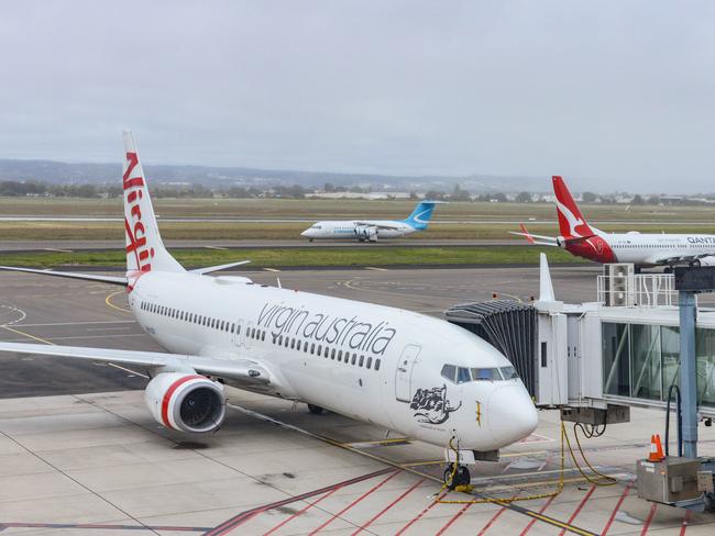 ADELAIDE, AUSTRALIA - NewsWire Photos SEPTEMBER 22, 2021: Virgin, Qantas and Cobham aircraft at Adelaide Airport. Picture: NCA NewsWire /Brenton Edwards