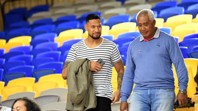 Rugby Union and former Wallabies player Israel Folau (left) is seen after the Round 14 Super Netball match between the Sunshine Coast Lightning and the Adelaide Thunderbirds at the USC Stadium on the Sunshine Coast, Saturday, August 24, 2019. (AAP Image/Dan Peled) NO ARCHIVING, EDITORIAL USE ONLY