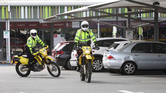 Queensland police force members taking part in an operation at Pimpama Junction Shopping Centre. Picture: Mike Batterham.