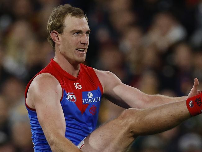 MELBOURNE , AUSTRALIA. April 4, 2024.  AFL Gather Round. Round 4.  Adelaide vs Melbourne at the Adelaide Oval.   Harrison Petty of the Demons kicks at goal   . Pic: Michael Klein