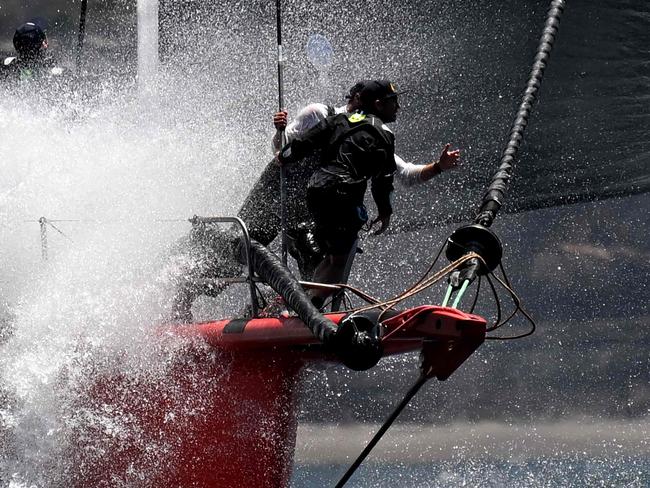 Master Lock Comanche competes in the 2024 SOLAS Big Boat Challenge on Sydney Harbour in Sydney on December 10, 2024. (Photo by SAEED KHAN / AFP) / -- IMAGE RESTRICTED TO EDITORIAL USE - STRICTLY NO COMMERCIAL USE --