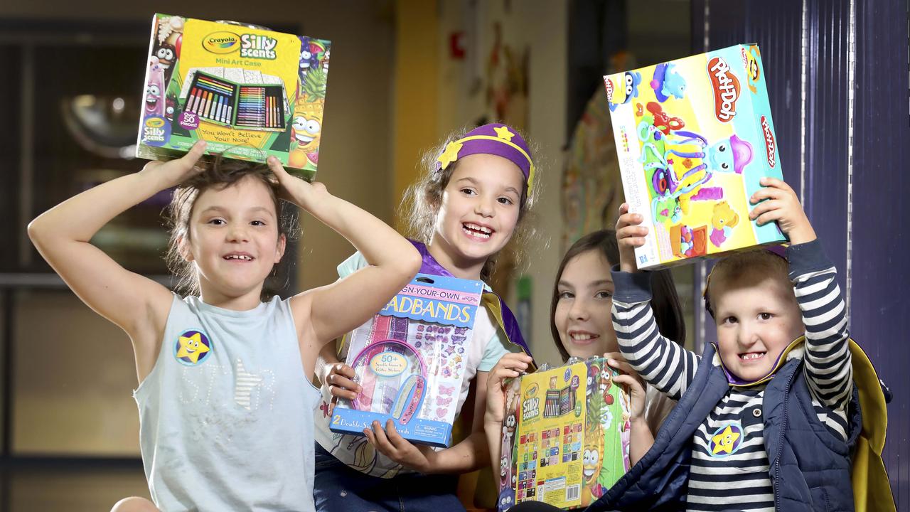 Liam, 3, Ruby, 6, Jordan, 7, and Danika,10 got a sneak peek at some of the toys. Picture Dean Martin