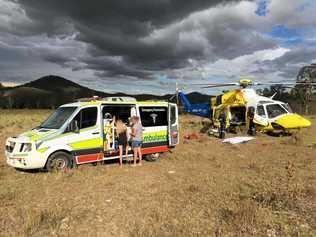 Paramedics attend the man at the Gympie region property before he was airlifted to hospital.