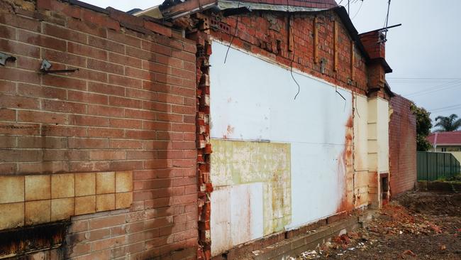 Builders tore down a house that shared a party wall with Yali Wu's Park Holme house without notifying her family and without getting planning approval. Picture: Yali Wu