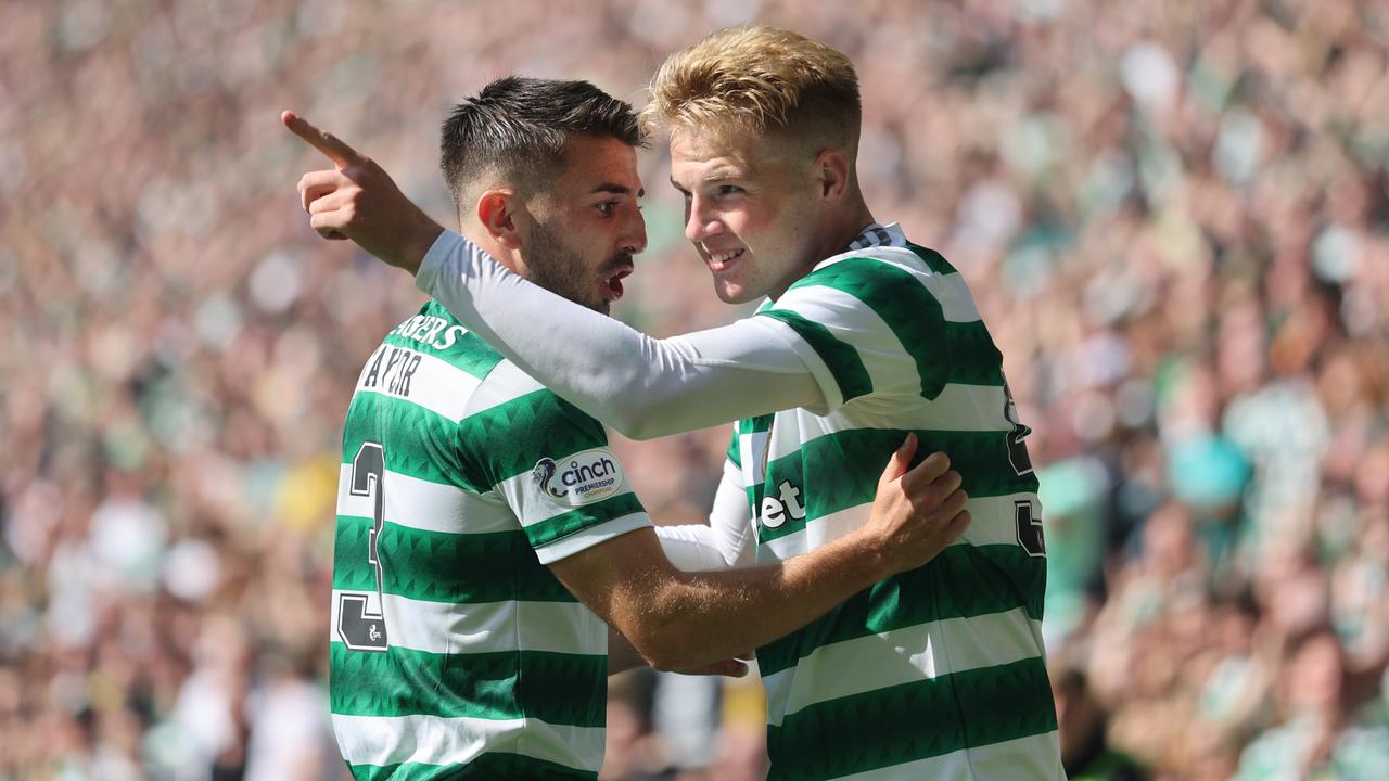 Goalscorer Stephen Welsh (right) celebrates with his Celtic teammate Greg Taylor. Picture: Steve Welsh/Getty Images