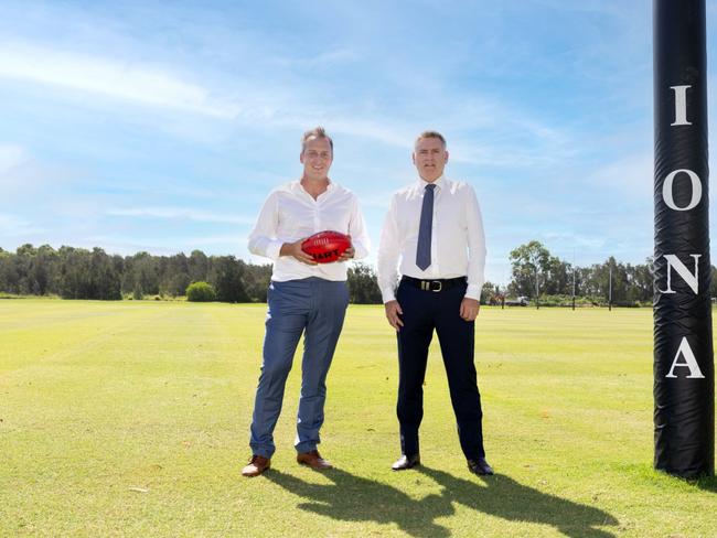 Pictured are Damien Mitchelmore (AFL Venue & Government Partnerships Manager, QLD), and Iona College Principal Trevor Goodwin.