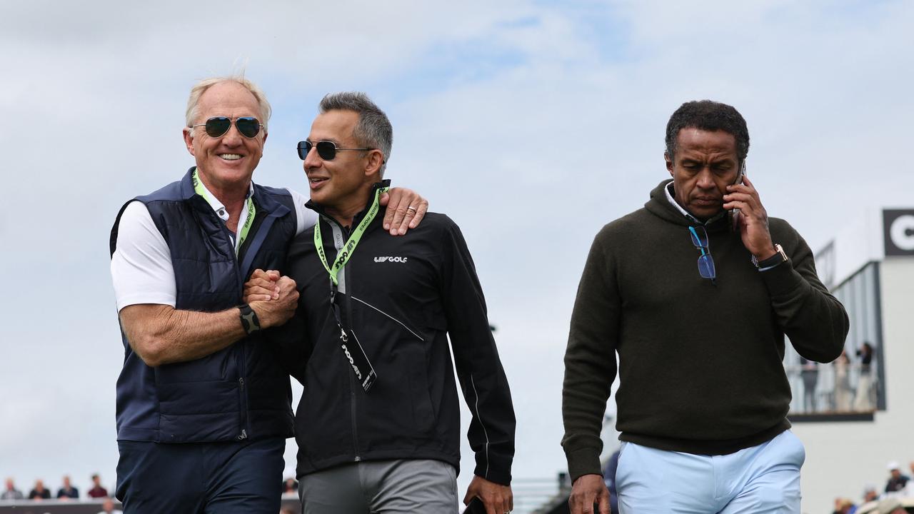 Chief Executive of LIV Golf, Greg Norman (L) and Saudi golf federation Chief Executive, Majed Al Sorour (R) leave the 1st tee on the first day of the LIV Golf Invitational Series event at The Centurion Club in St Albans. Picture: Adrian Dennis/AFP