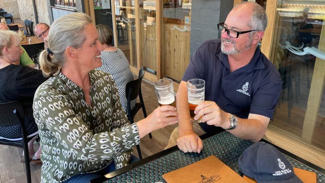 Labor Mawson MP Leon Bignell and his Liberal opponent Amy Williams set aside their differences for the fight for Mawson and capped off a hard-fought campaign with a cold beer. Picture: Supplied