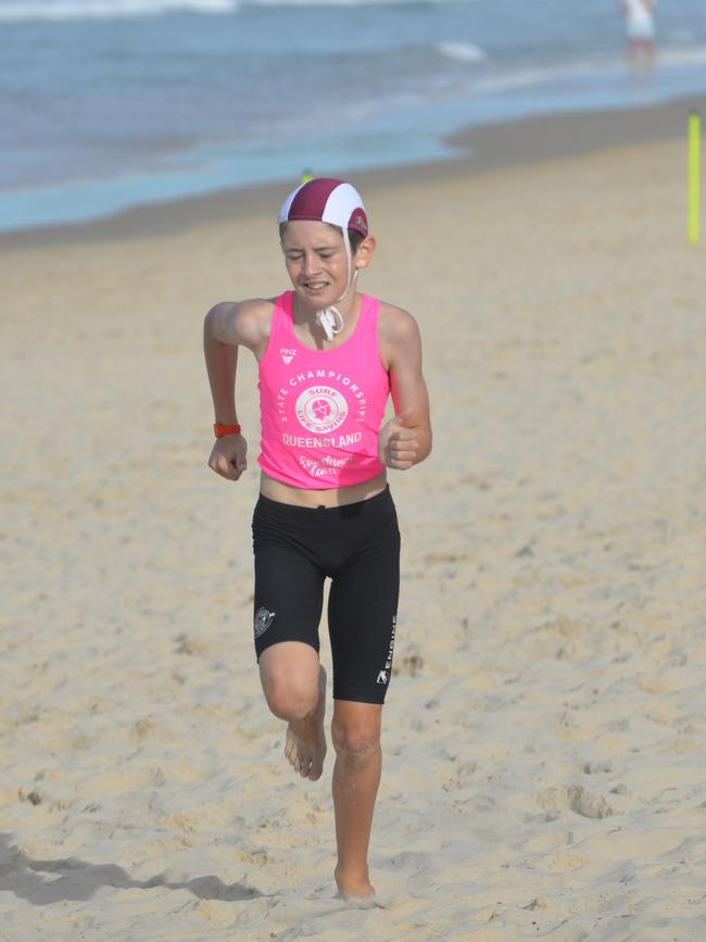 Running action at the Queensland Youth Surf Life Saving Championships on February 17.