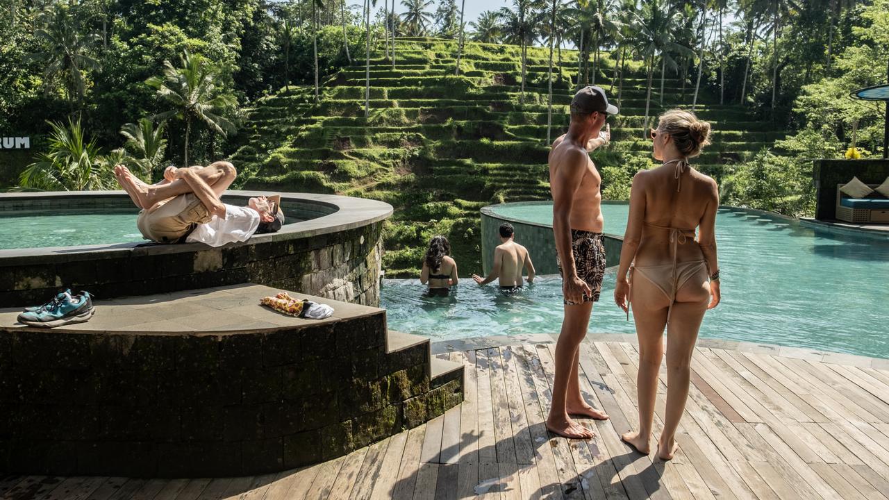 Foreign tourists photographed in Ubud, Indonesia. Picture: Agung Parameswara/Getty Images