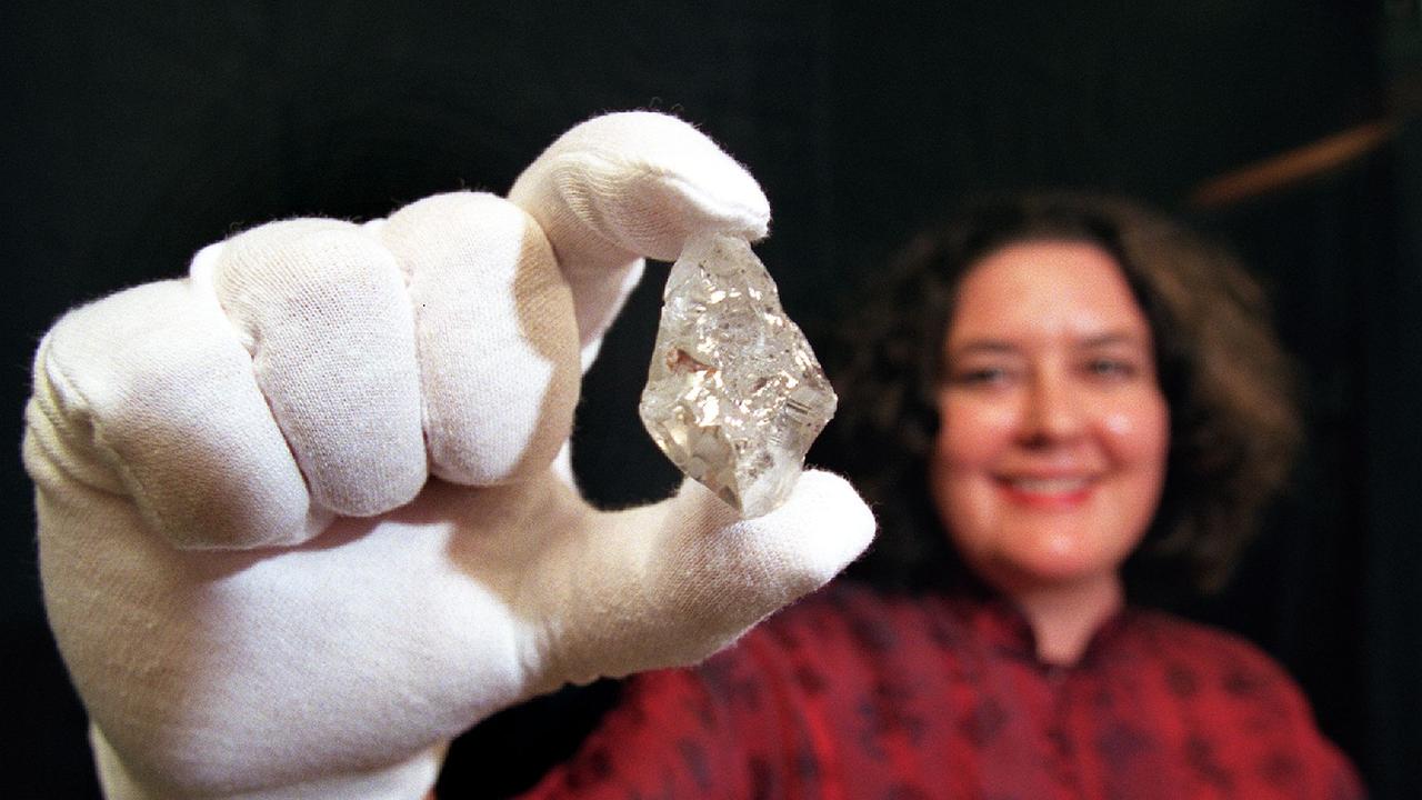 Wendy Wood from MAGNT in 2003 with Australia's largest diamond from the Merlin mine. Picture: PATRINA MALONE