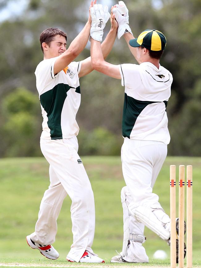 Cameron Bukowski is congratulated for taking a wicket playing for Villa. Picture by Richard Gosling