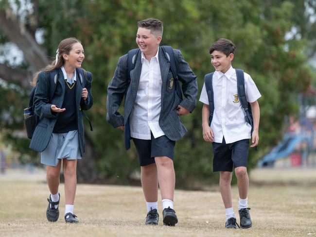 St John's Regional College students, Holly Egan, Flynn Hyland and Daniel Hainagiu are starting year 7 this year. Picture: Tony Gough