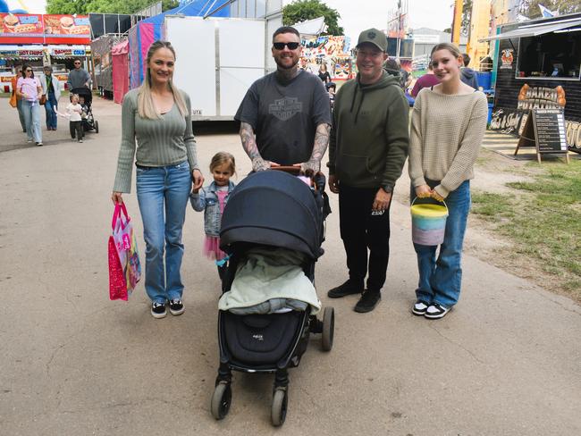 Attendees enjoying the 159th Sale Agricultural Show at the Sale Showgrounds on Friday, November 01, 2024: Breeanna Slattery, Savannah, Craig Guthrie, Savannah Milesjones and Chris Jones. Picture: Jack Colantuono